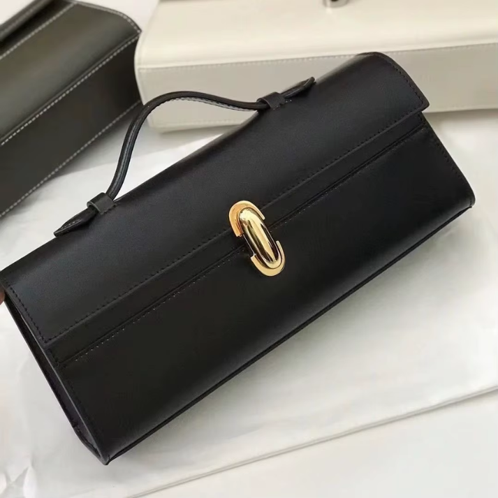Bolsa Clutch de Mão Feminina em Couro com Alça Superior e Fechamento Moderno - Clara